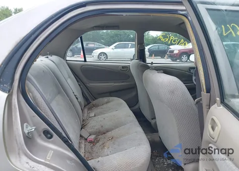 1999 Toyota Corolla Ce from USA, damaged, VIN 2T1BR12E3XC246635